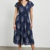 Navy blue midi dress with tree print, featuring V-neck, short sleeves, tiered design, and an elegant natural style, suitable for daily wear or mature casual looks.