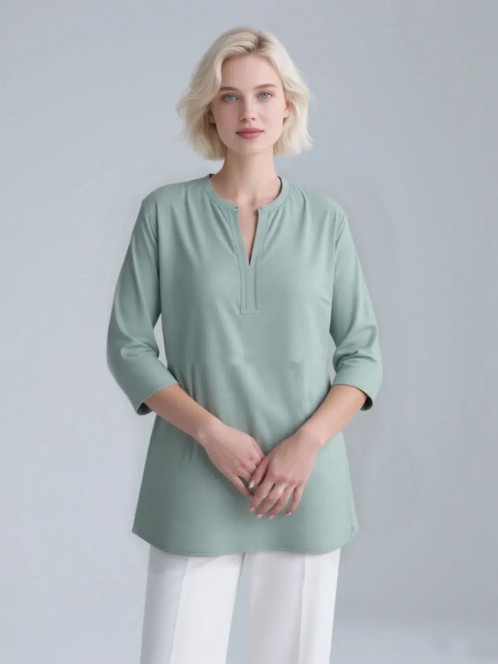 Light mint green V - neck 3/4 - sleeve top, featuring a minimalist and elegant design, suitable for daily or light business wear.