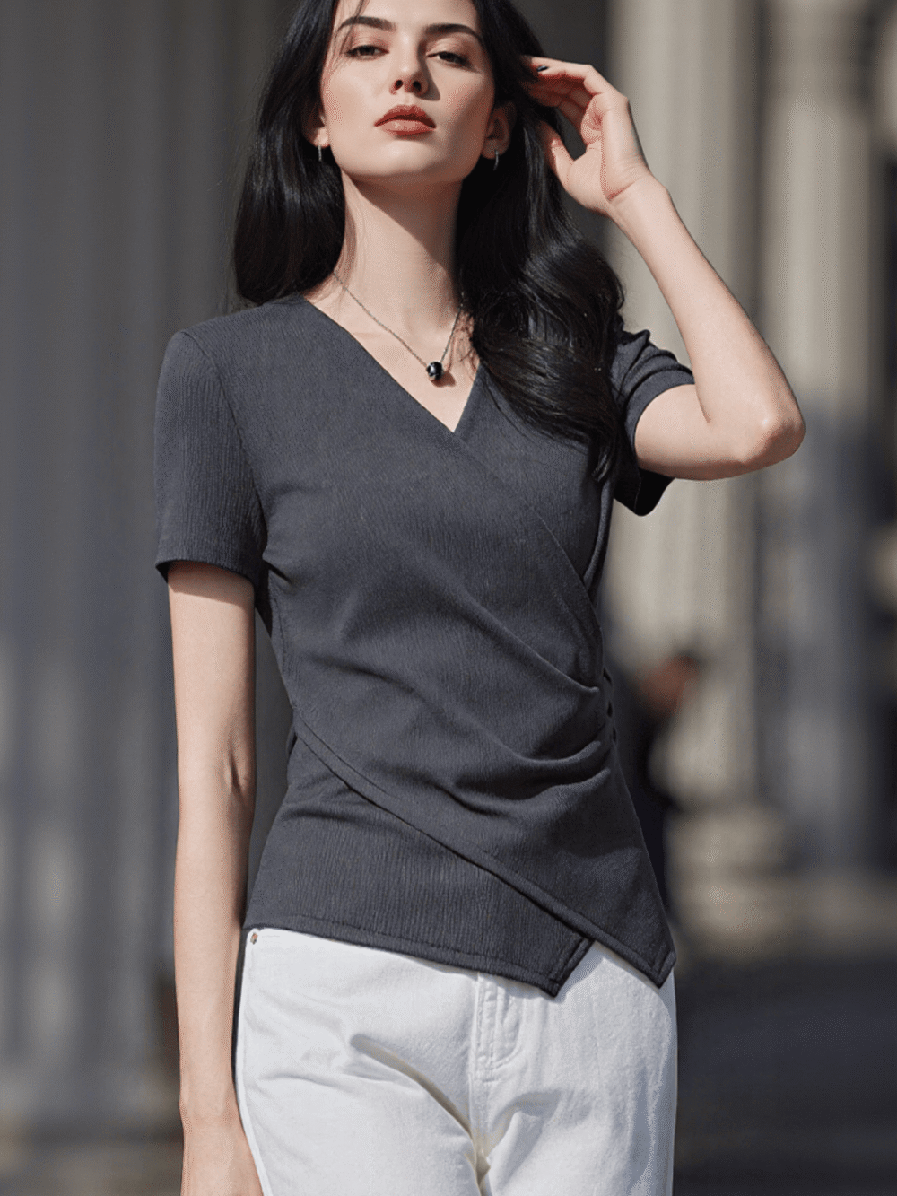 Dark gray V - neck short - sleeve top with side draping, featuring a minimalist and elegant design, suitable for daily or light business wear.
