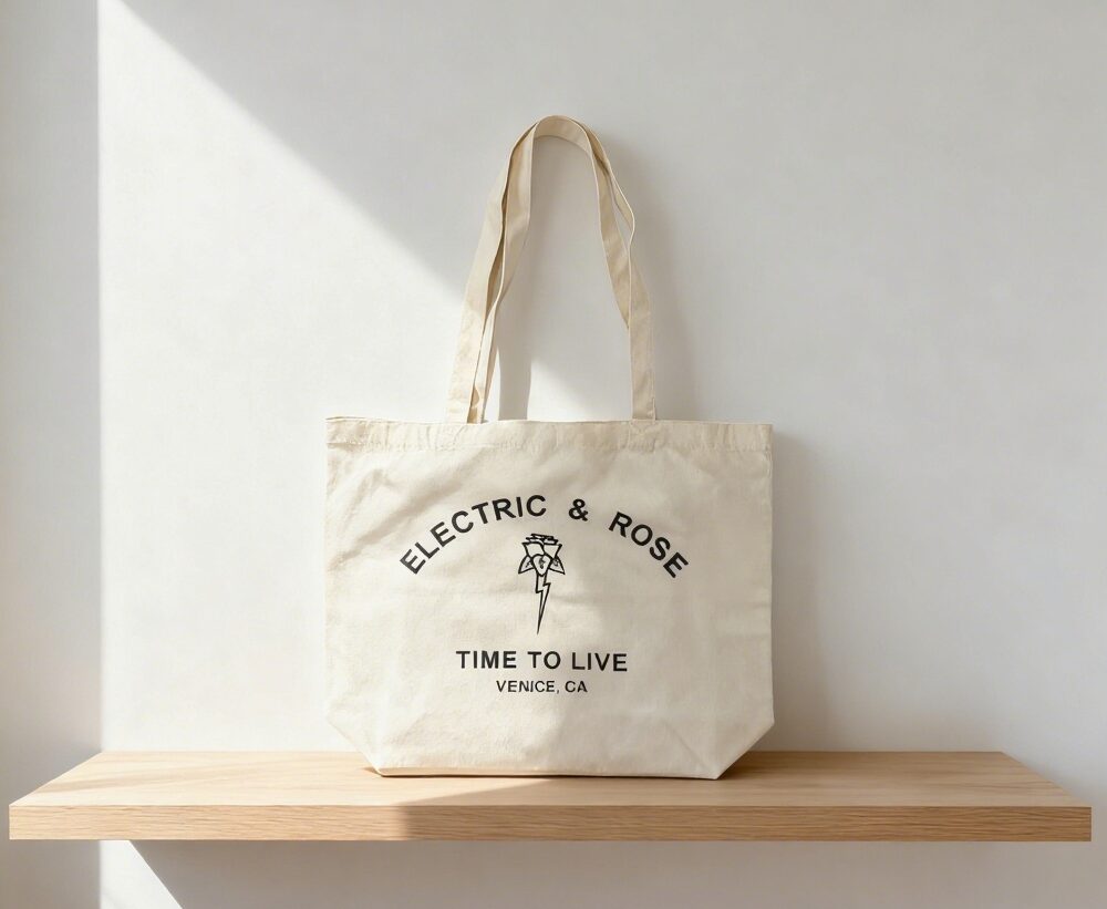 Canvas tote bag with "Electric & Rose" and "Time to Live Venice, CA" custom logo