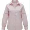 Light pink collared shirt-flat Light pink collared shirt - trimmed cutout details on long sleeves.