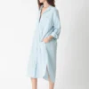 100 - cotton - shirt - dress - light - blue.webp 100% cotton shirt dress in light blue with shirt - style details (collar, buttons, pocket, slit)