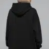 oversized-black-hoodie-model-back.jpg Model wearing oversized black hoodie (back view)