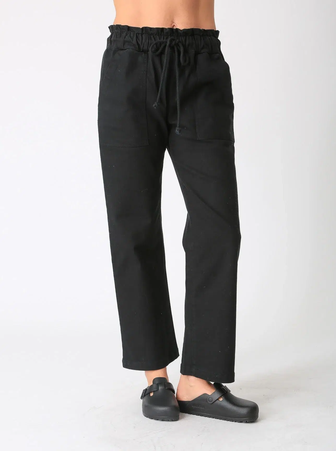 Dyed classic casual pants in black with drawstring (front view)