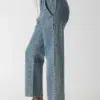 Classic linen - cotton casual denim jeans in medium blue with drawstring, styled with light brown shoes (side view)