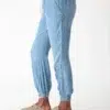 Light blue denim jogger pants (side view)