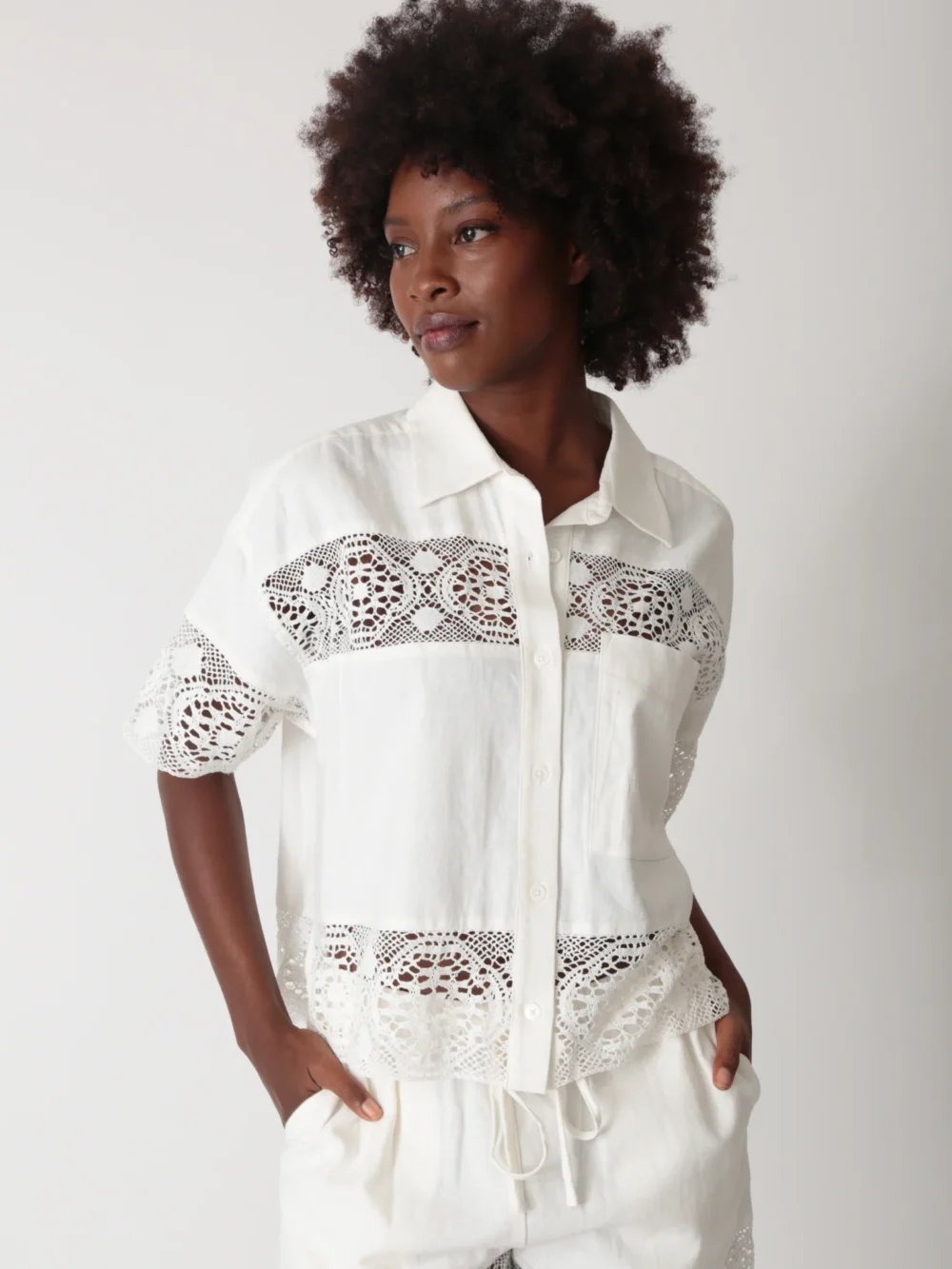 White lace - embellished shirt and shorts set, featuring a fresh and fashionable design