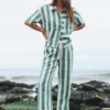100% linen yarn - dyed green and white striped loungewear set including a striped shirt and wide - leg pants, casual and vacation - ready design