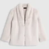 light beige faux fur short Smoothie Jacket- flat Light beige faux fur short coat with a shawl collar, displayed against a light background.