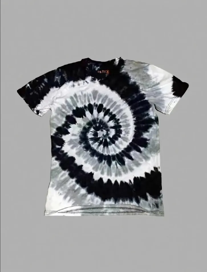 Black and white spiral tie - dye short sleeve t - shirt displayed against a gray background.