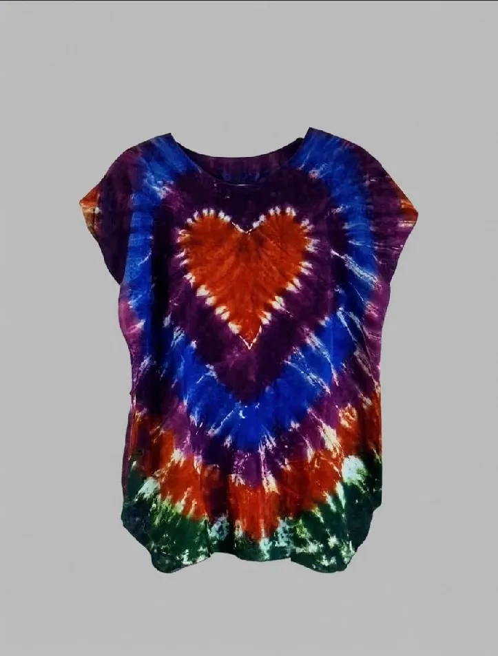 Multicolor heart tie - dye short sleeve top displayed against a gray background.