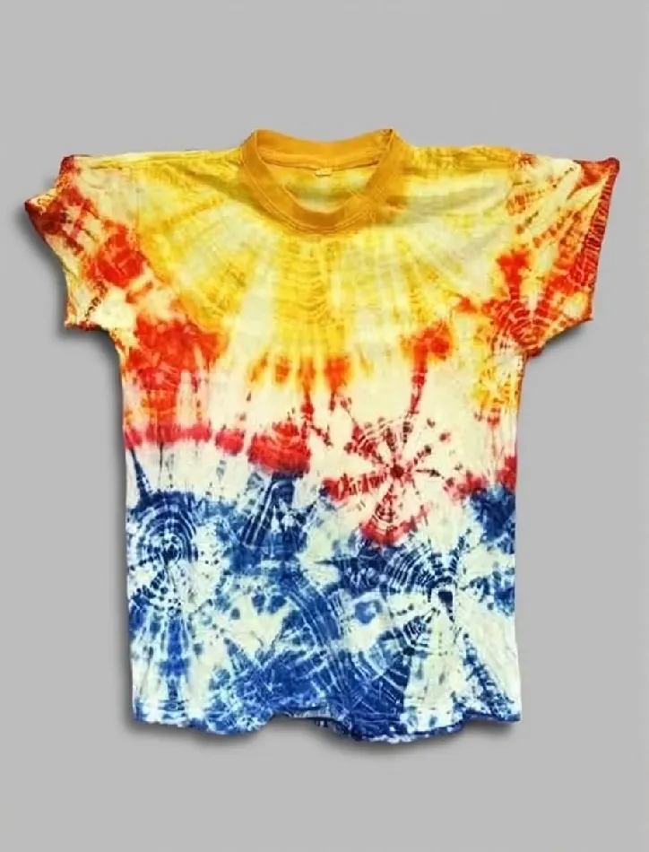 Rainbow burst tie - dye short sleeve top displayed against a gray background.
