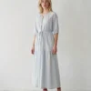 Light Grey Blue Drawstring Waist Midi Dress Side view of light grey blue drawstring waist V-neck midi dress with half sleeves