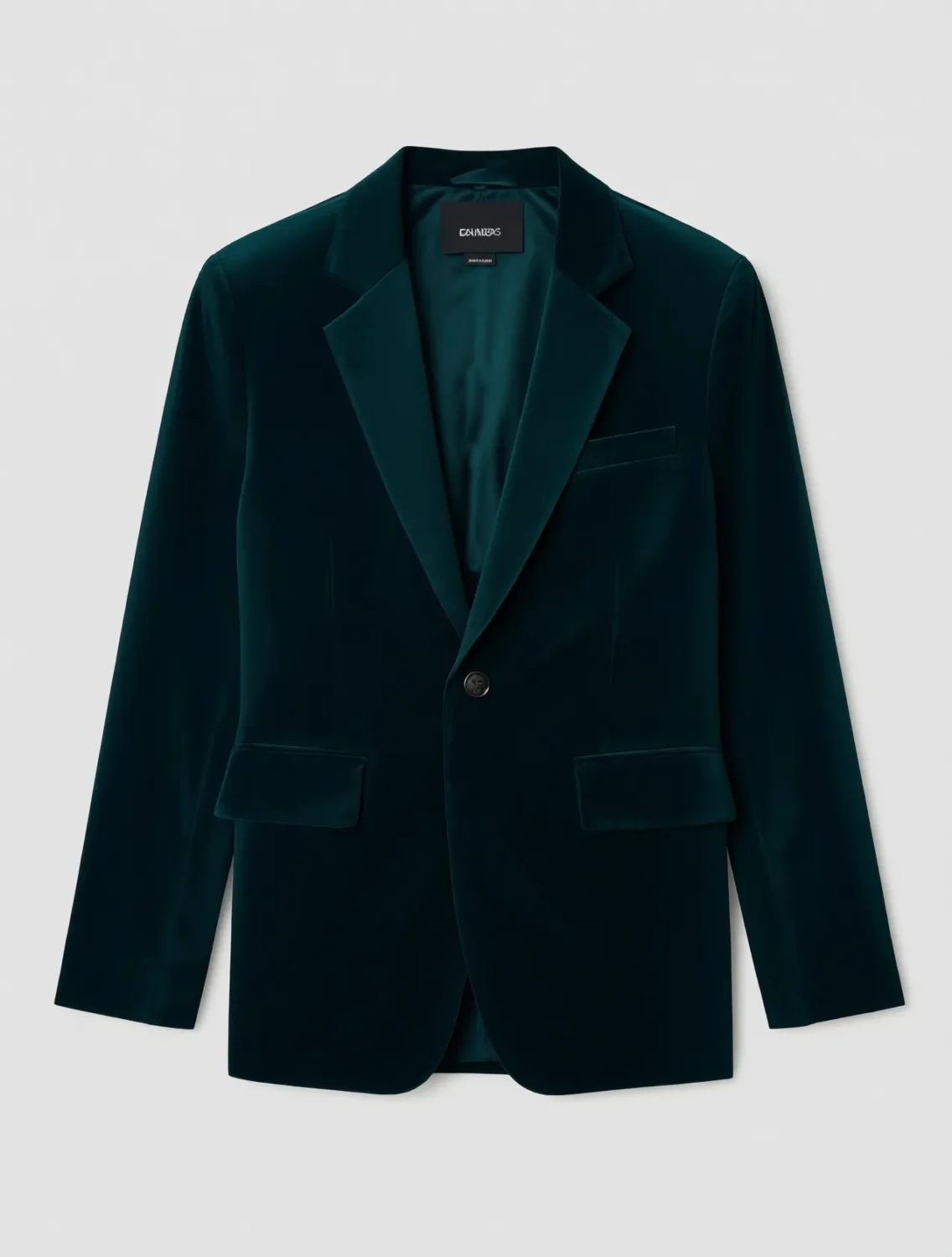Emerald green velvet blazer flat lay, single button closure detail