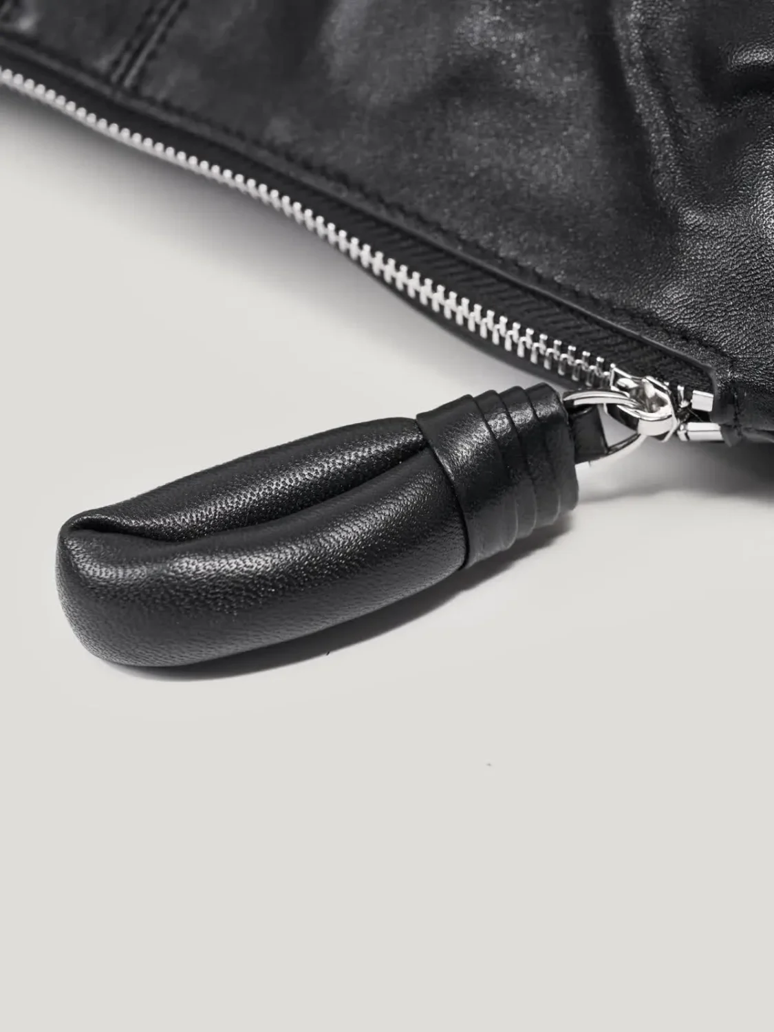 Leather Crossbody Bag top view, professional studio photography, gray background, 3:4 ratio, handmade leather crossbody bag, 3Nice 3NiceClothing