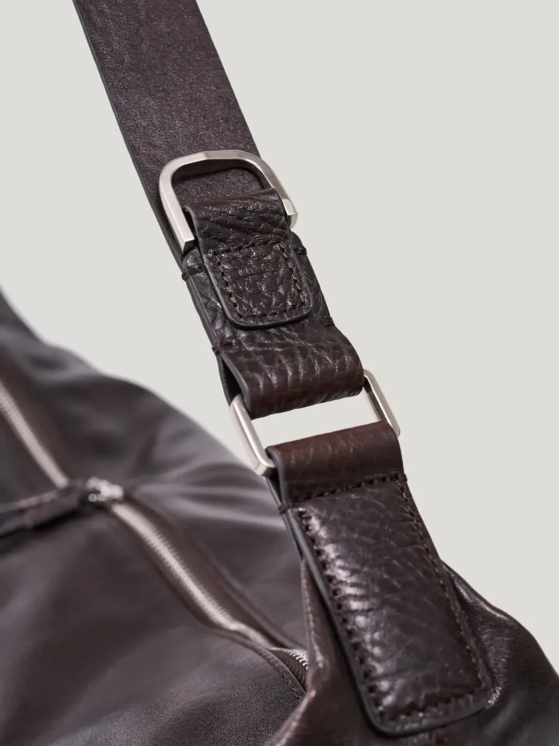 Leather Shoulder Bag angle view, professional studio photography, gray background, 3:4 ratio, handmade leather shoulder bag, 3Nice 3NiceClothing