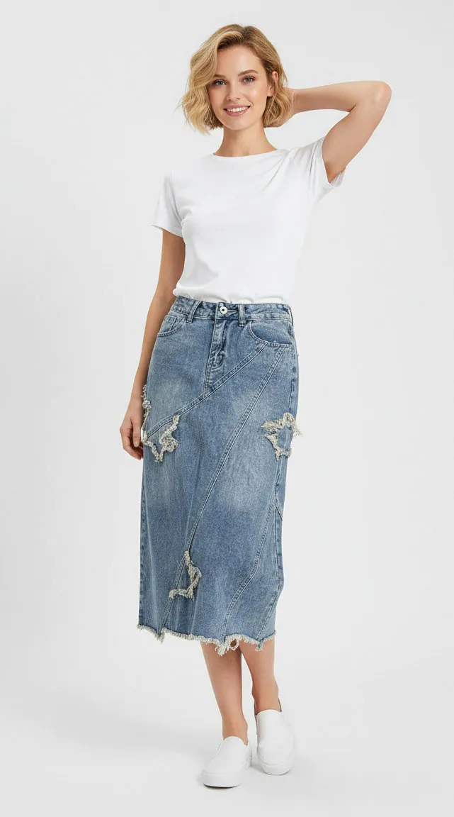 Distressed denim midi skirt with raw hem and ripped details, paired with a white short-sleeve top, featuring a casual style, suitable for daily wear.