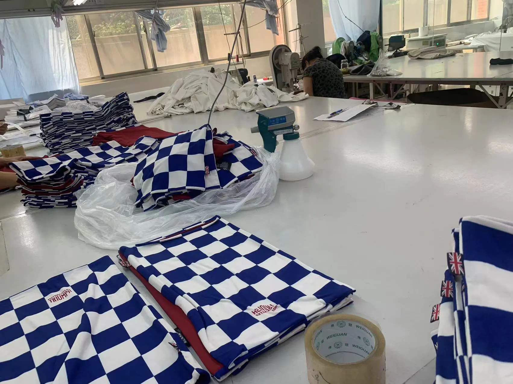 Garment Manufacturing Workshop with Checkered Fabric