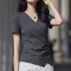 Dark gray V - neck short - sleeve top with side draping, featuring a minimalist and elegant design, suitable for daily or light business wear.