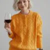 yellow-cable-knit-sweater-model-display.jpg Model wearing yellow cable - knit sweater