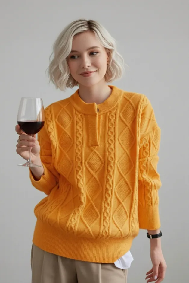 Model wearing yellow cable - knit sweater