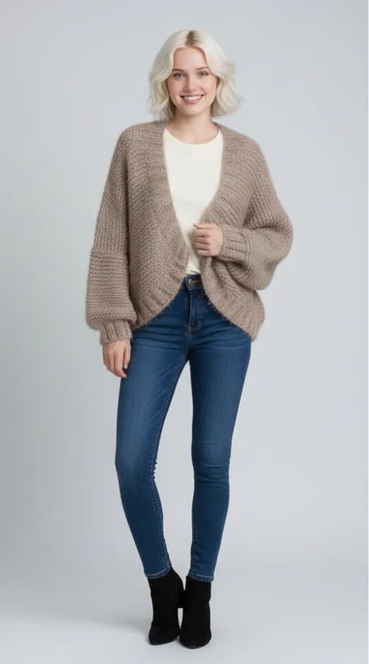 Model wearing beige oversized knit cardigan