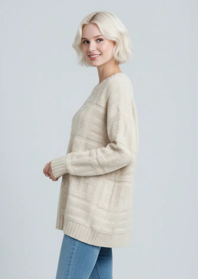 Model wearing beige geometric - patterned sweater