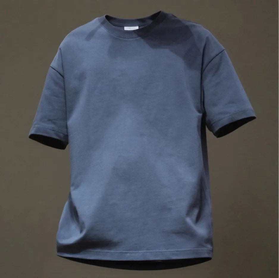 Display of slate blue oversized short sleeve T - shirt