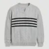 Display of light gray split - neck cable - knit sweater with black stripes