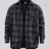 Display of black and brown plaid button - front shirt
