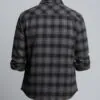 Back display of black and brown plaid button - front shirt