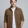 Model wearing khaki button - front shirt