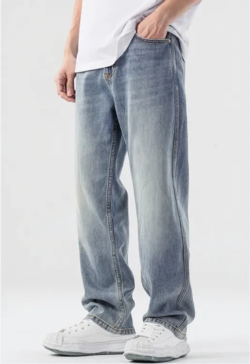 light-blue-loose-fit-jeans-model-side.jpg Model wearing light blue loose-fit jeans (side view)