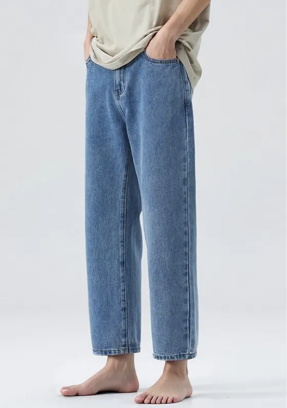 light-blue-wide-leg-jeans-model-side.jpg Model wearing light blue wide-leg jeans (side view)