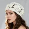ivory-crochet-flower-hat-model.jpg Model wearing ivory crochet flower hat