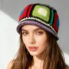 multicolor-granny-square-crochet-bucket-hat-model.jpg Model wearing multicolor granny square crochet bucket hat