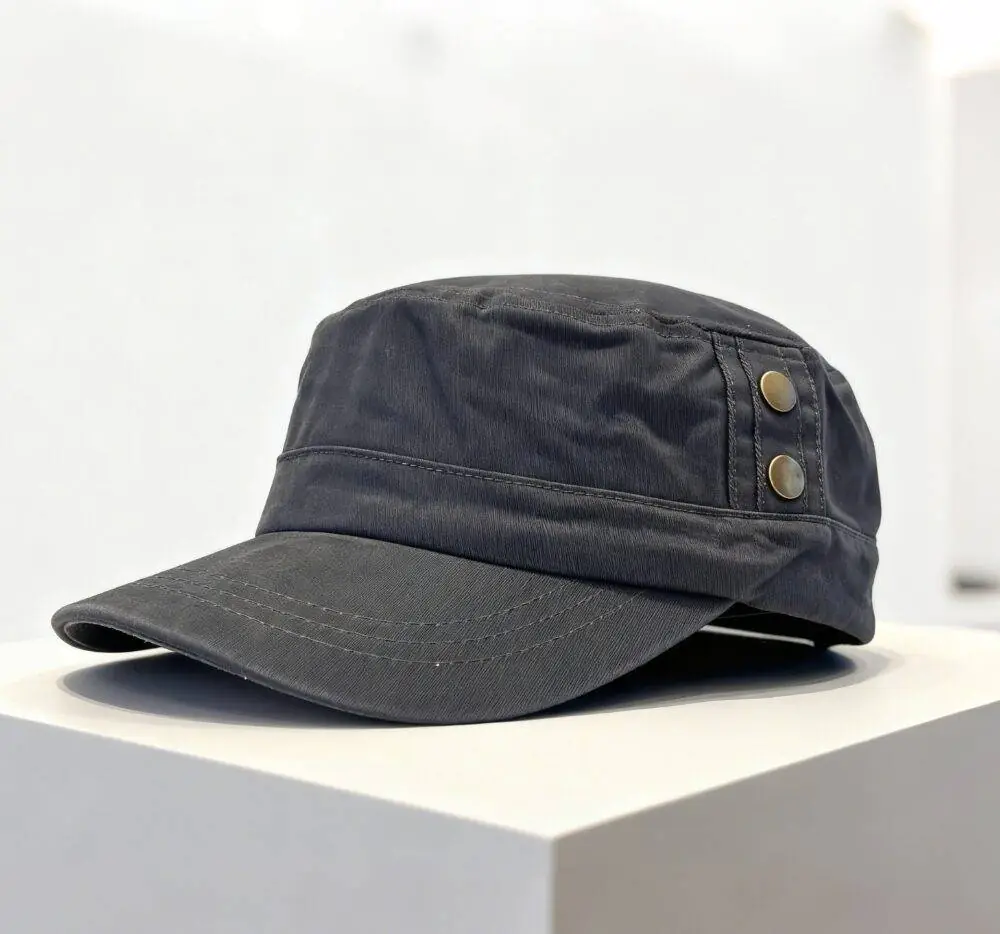 Dark gray military - style cap with brass buttons