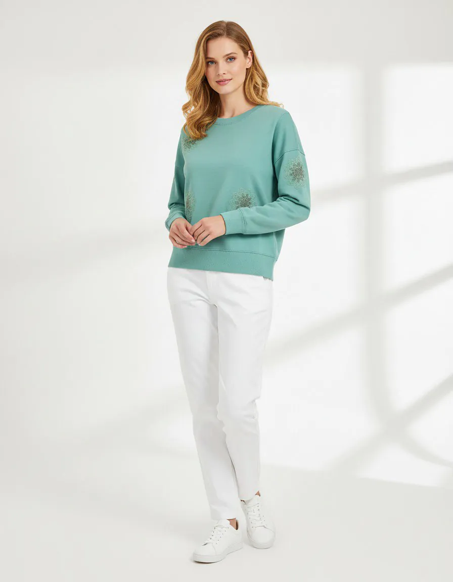 Turquoise long - sleeve T - shirt with hollow embroidery (front view)