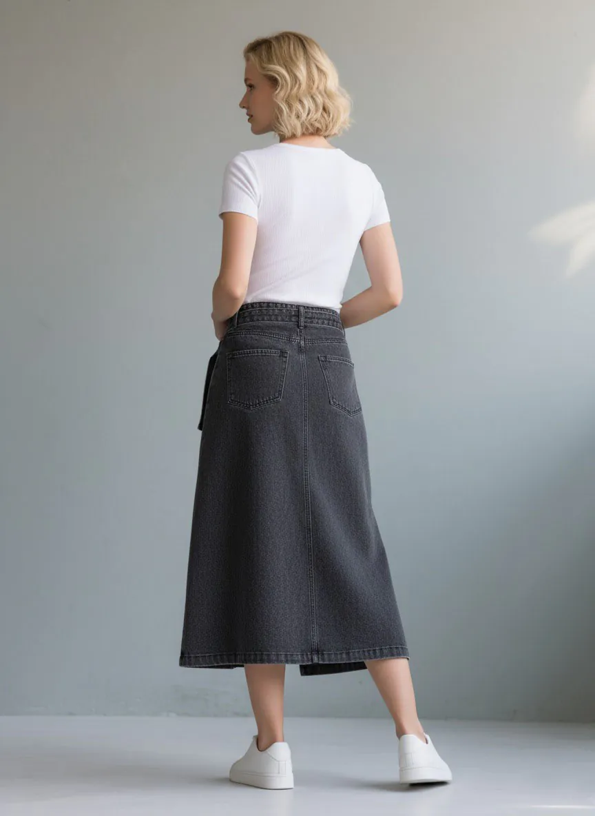 White short - sleeve fitted top paired with dark gray asymmetric denim midi skirt with belt, featuring a minimalist and stylish design, suitable for daily wear or light workplace outfits.