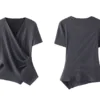 Dark gray wrap V - neck short - sleeve top with side buttons, featuring a minimalist and elegant design, suitable for daily or light business wear.