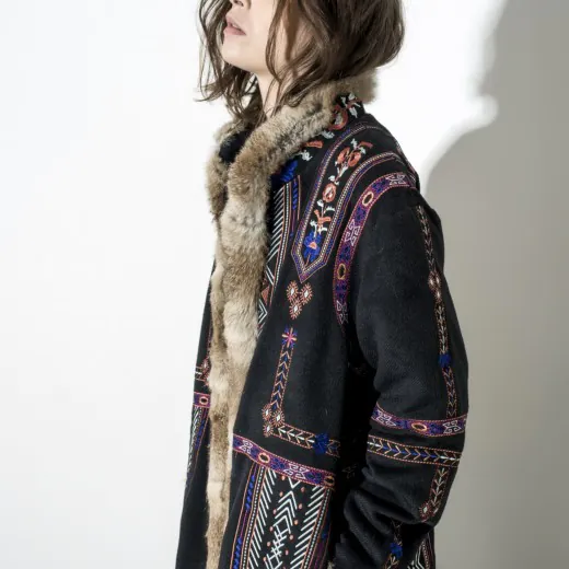 embroidered-fur-trimmed-coat-side-view-model-display.jpg embroidered-fur-trimmed-coat-side-view-model-display.jpg