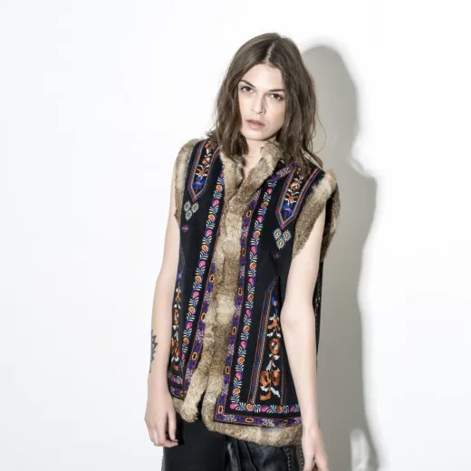 embroidered-vest-with-rabbit-fur-trim-front-view-model-display.jpg Model wearing embroidered vest with rabbit fur trim